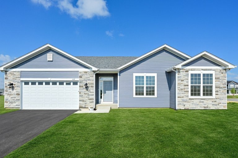 Front exterior of the Gerstad Builders Truman floor plan new construction home in Northern Illinois with attached garage and ranch layout.